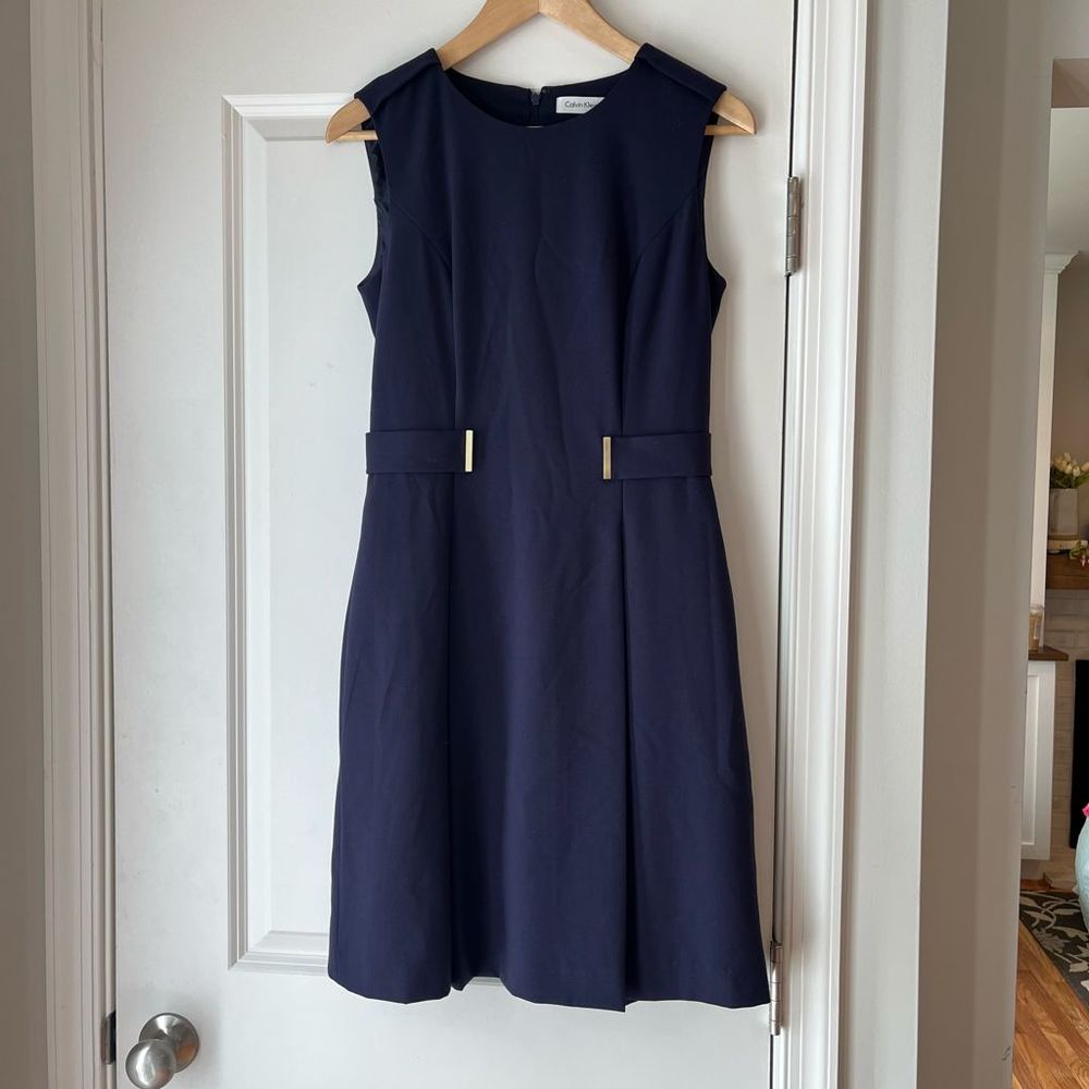 Calvin Klein navy dress with gold accents